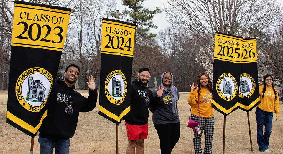 Class presidents hold their graduating year flags with student body president Ashrakat Hasan '24.