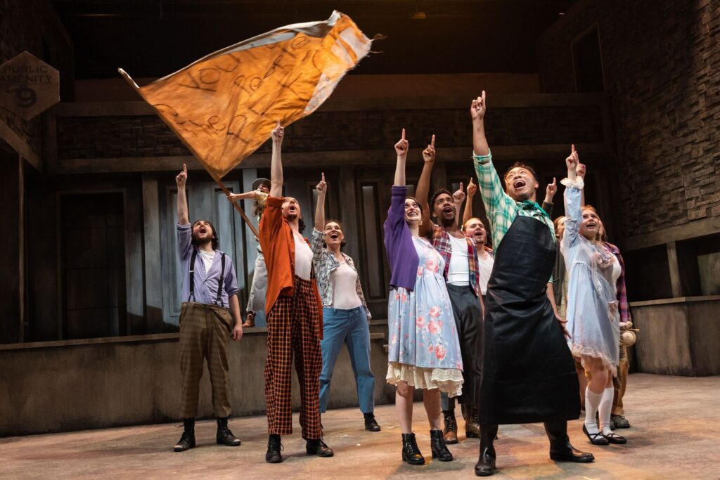 OU students and Actor's Express performers on stage during Urinetown 2023.