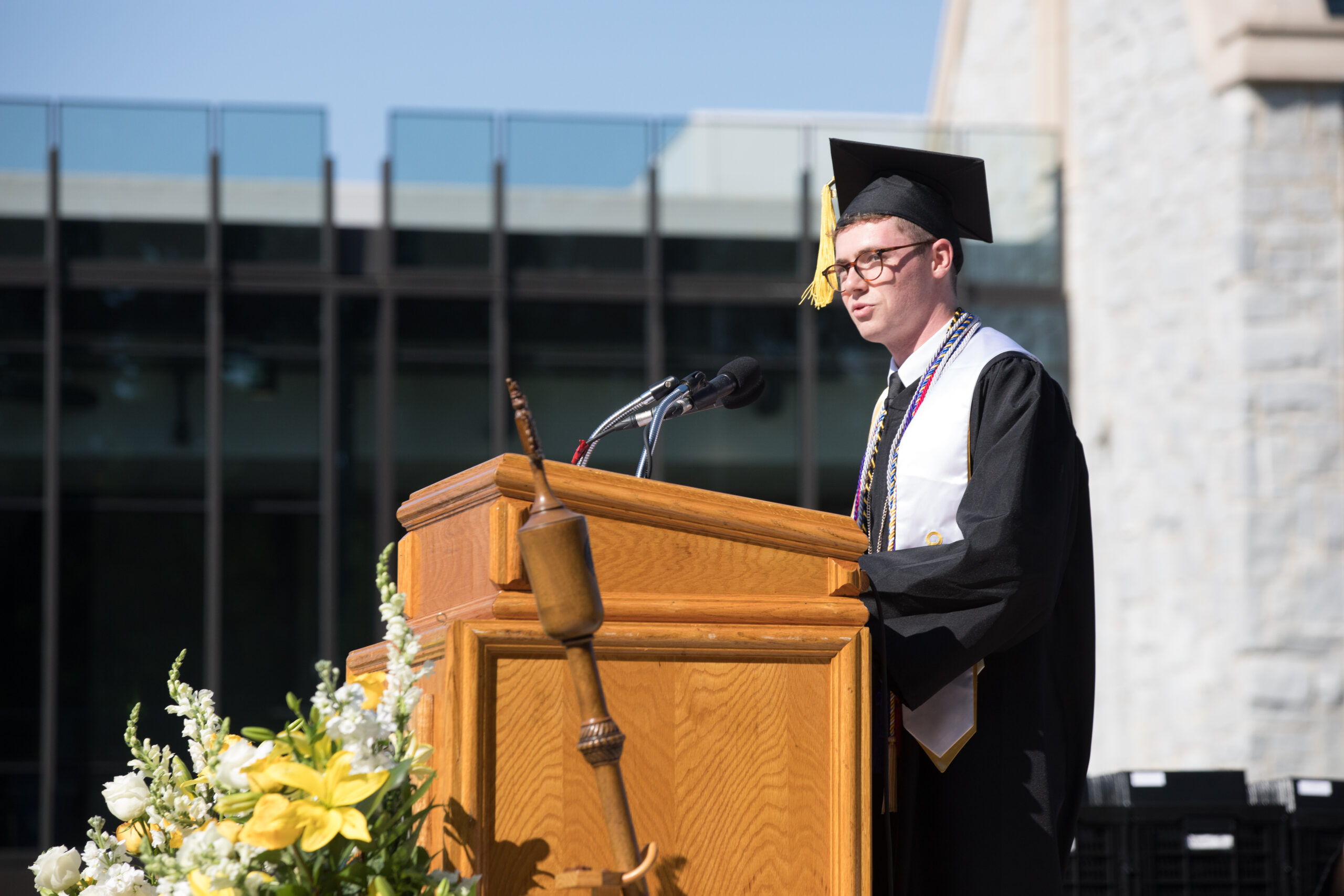 Brad Firchow '19 speaking at commencement