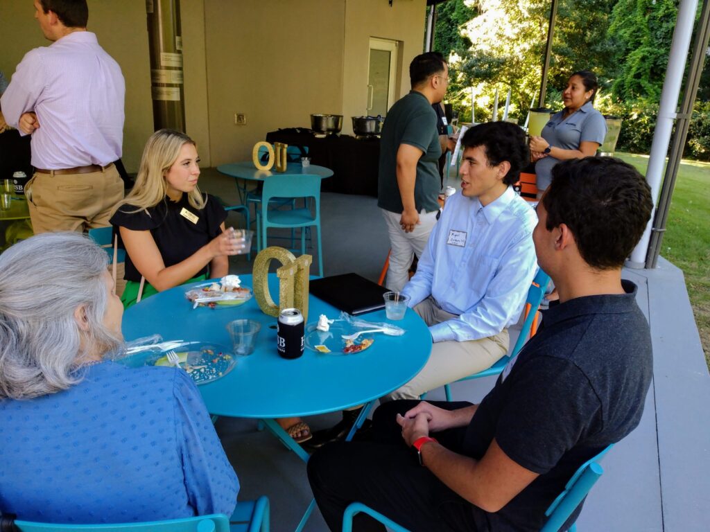 Oglethorpe accounting students talk to recruiters on the Conant veranda