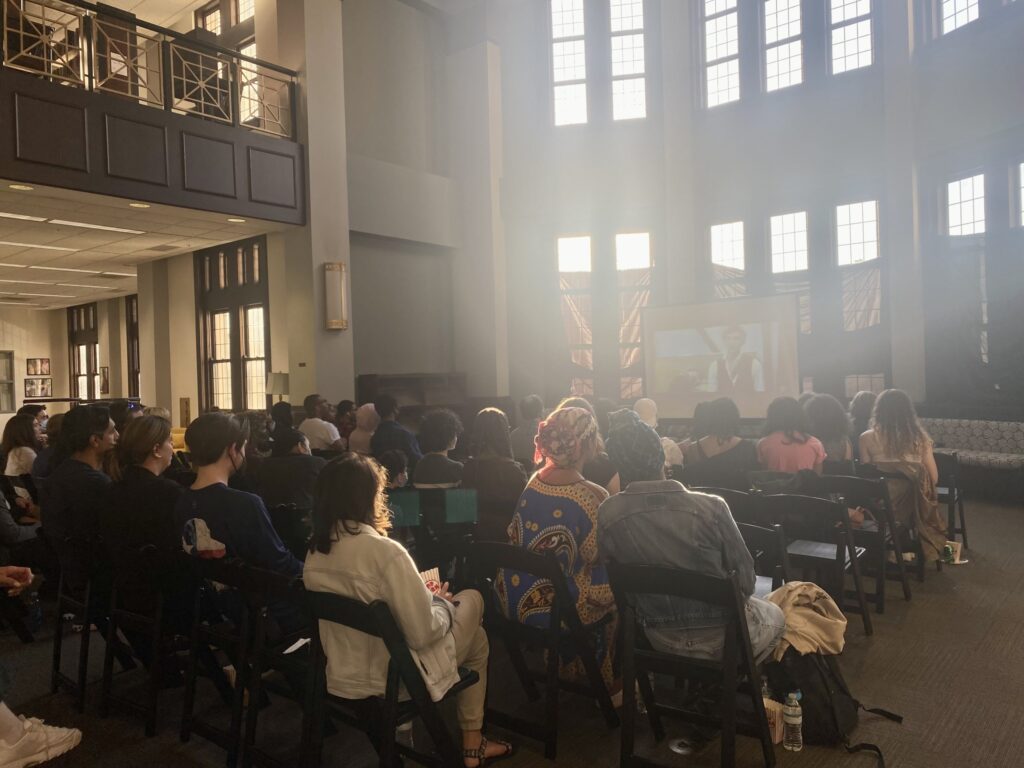 Students in the Philip Weltner Library watch shorts films at the "Last Looks" film festival