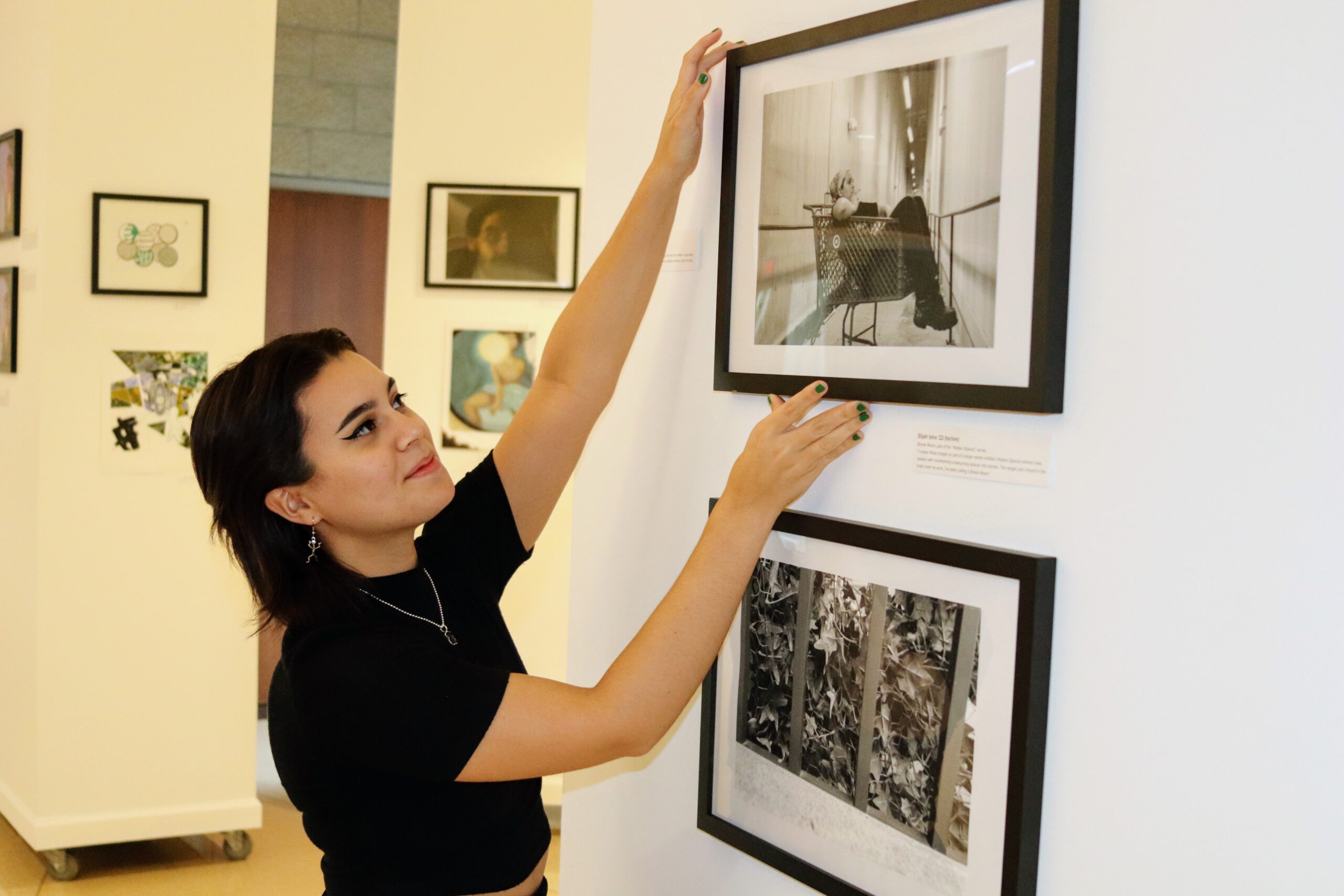 Sophia Sobrino '24 hangs art in "Oglethorpe's Portfolio"