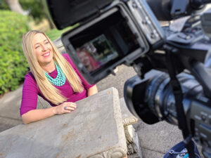 Woman in front of a camera