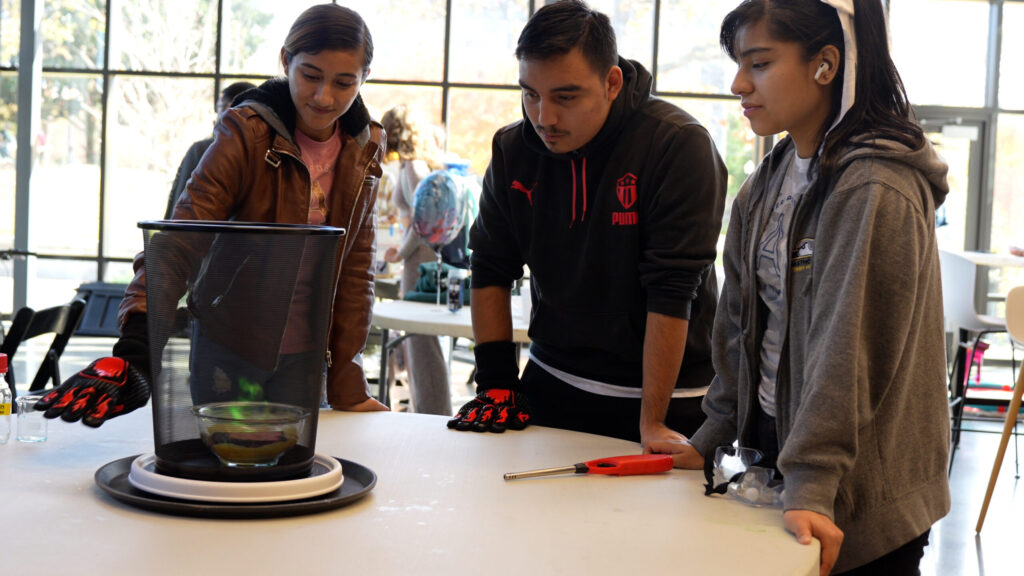 Oglethorpe students watch a fire tornado experiment