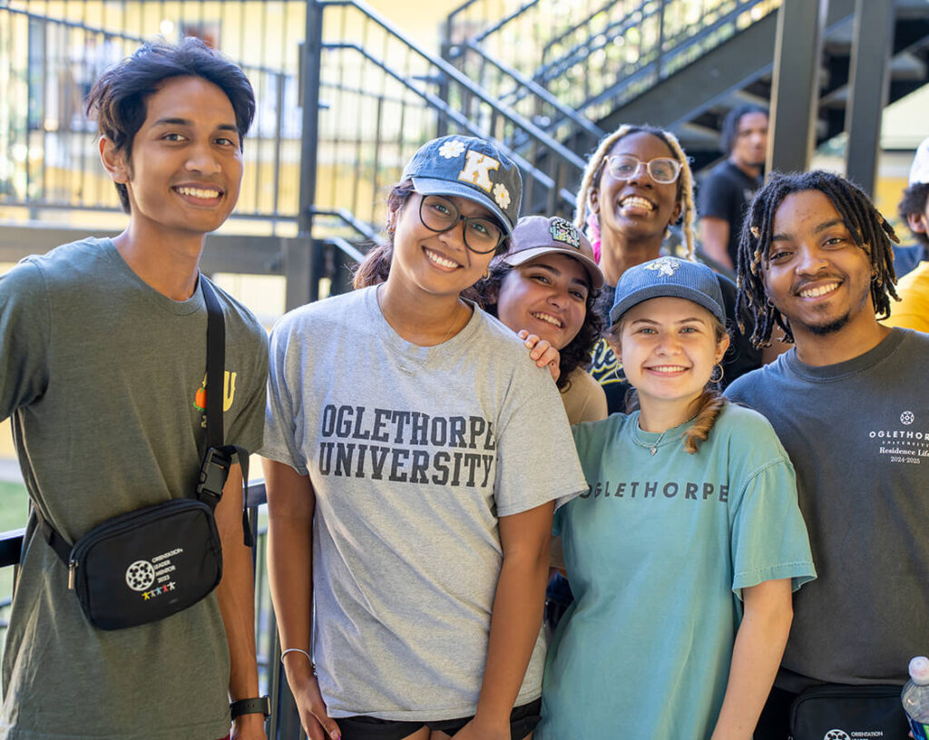 RA's pose for a photo in Traer Hall during move-in day.