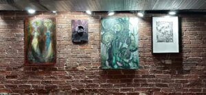 Four pieces of art work by Luna Ramirez displayed in the Besharat Gallery.