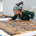 Kate Arrett '25 works on "The Emperor's Stables"