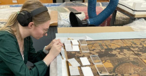 Art history major Kate Arrett ‘25 helps restore an ancient Japanese folding screen belonging to the Oglethorpe University Museum of Art at her internship with the Atlanta Conservation Center.