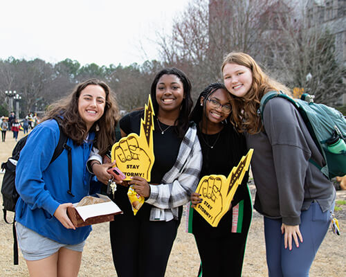 A group of students gathered together