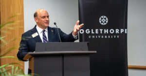 Tim Tassopoulos speaks at a community breakfast in honor of Dr. McClymond on her inauguration.