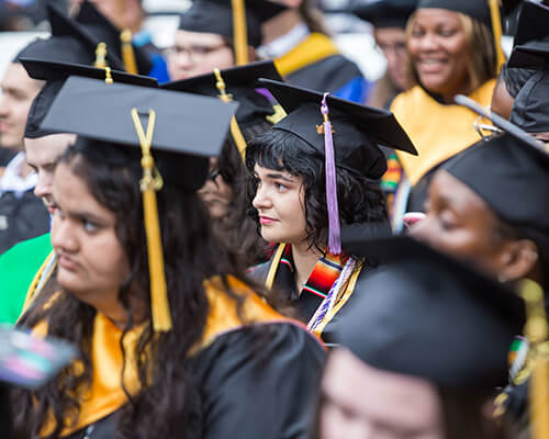 Students at a graduation.