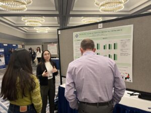 Oglethorpe student Mekela Iorio presents her research poster at the Southeastern Psychological Association conference