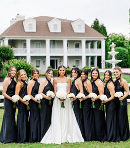 Taylor Dodson '20 posed with her bridesmaids on May 10, 2025 in Loudon, TN.