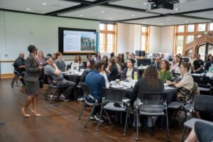 Ama Agyapong addresses a crowd of Oglethorpe staff members