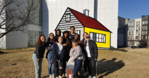Students pose on the lawn at the High Museum of Art in Atlanta