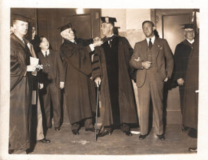 Franklin D. Roosevelt with university faculty for the 1932 commencement address for Oglethorpe University at the Fox Theatre.