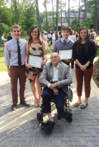 Fred Agel with scholarship recipients in 2016.