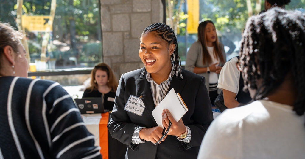 Blessia meets with employers at the Career and Graduate School Fair.