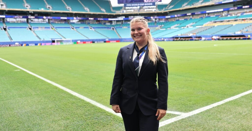 Marissa Romaine standing on a soccer field