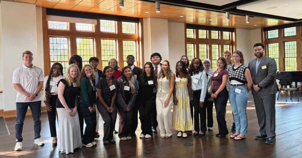 A group photo of Oglethorpe students and educators