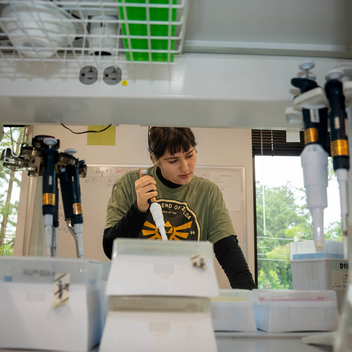 A student works in the science lab.